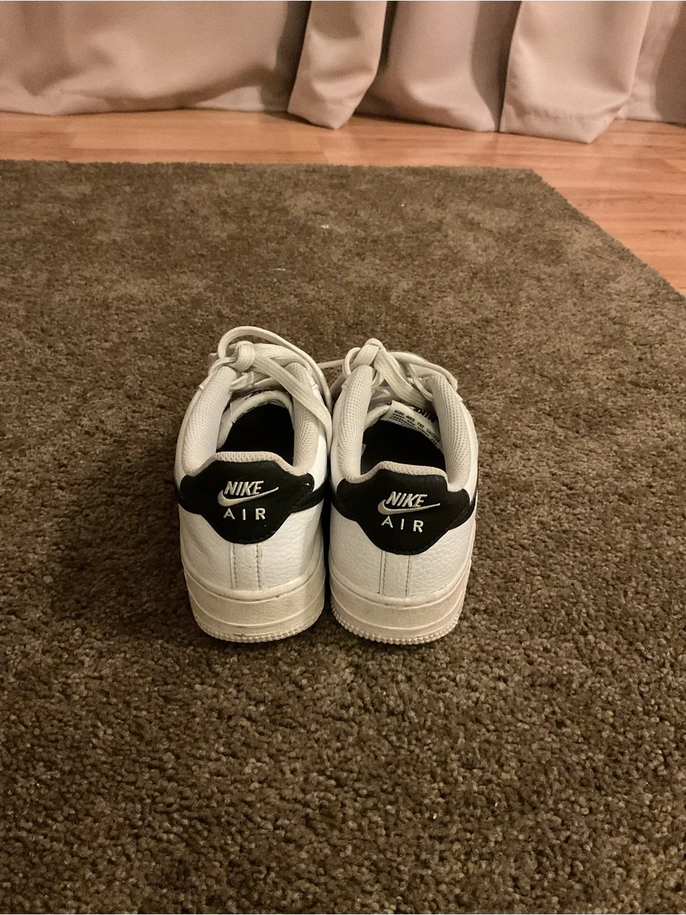 Nike Women’s White and Black Sneakers